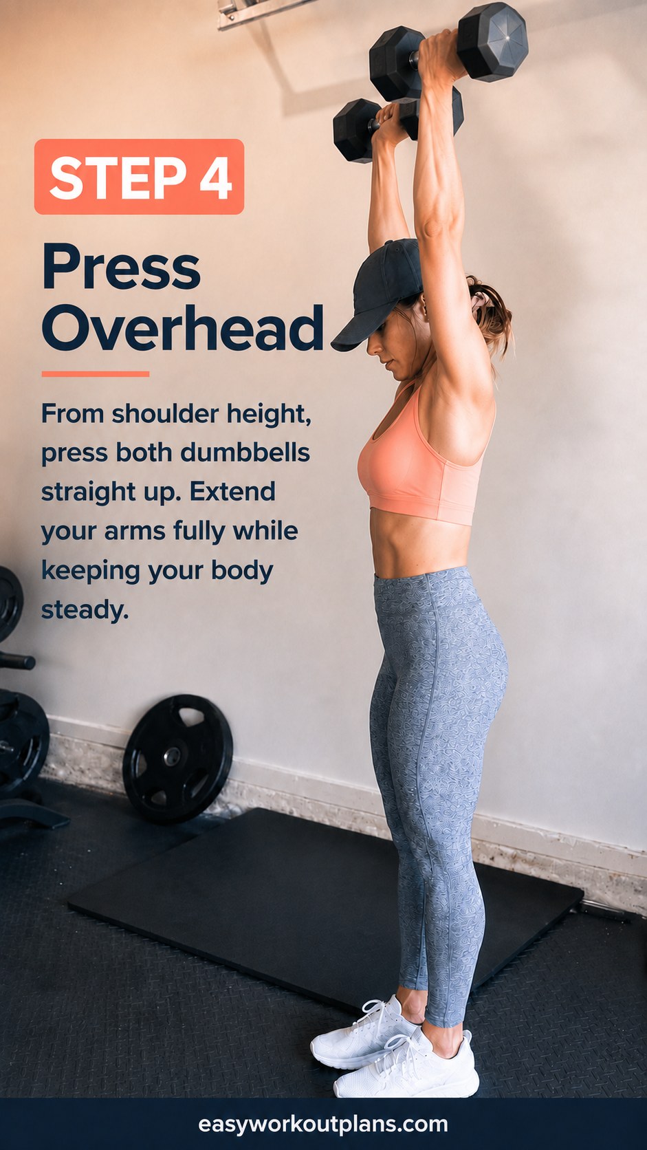 Pressing both dumbbells straight overhead from shoulder height in this dumbbell arm workout move.