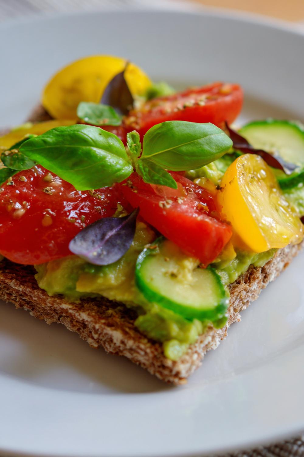 16. Easy Healthy Snacks 2026: Smashed Avocado Tomato Crispbread with Basil