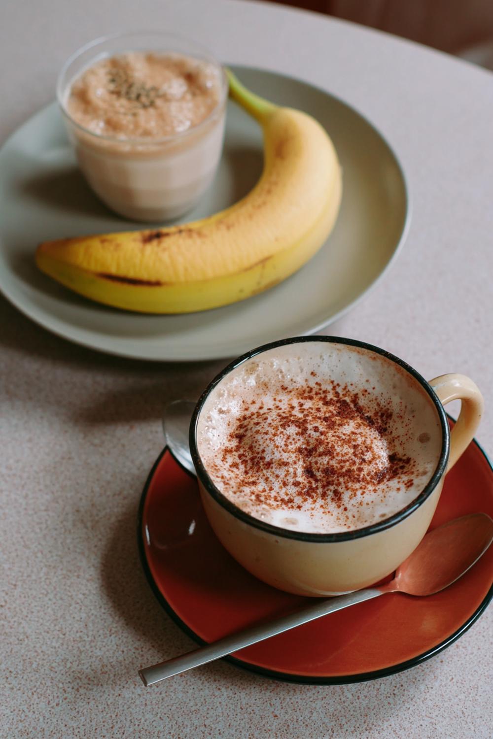 18. Pre Workout Breakfast Ideas 2026: Oat Milk Cappuccino and Banana Pairing Plate